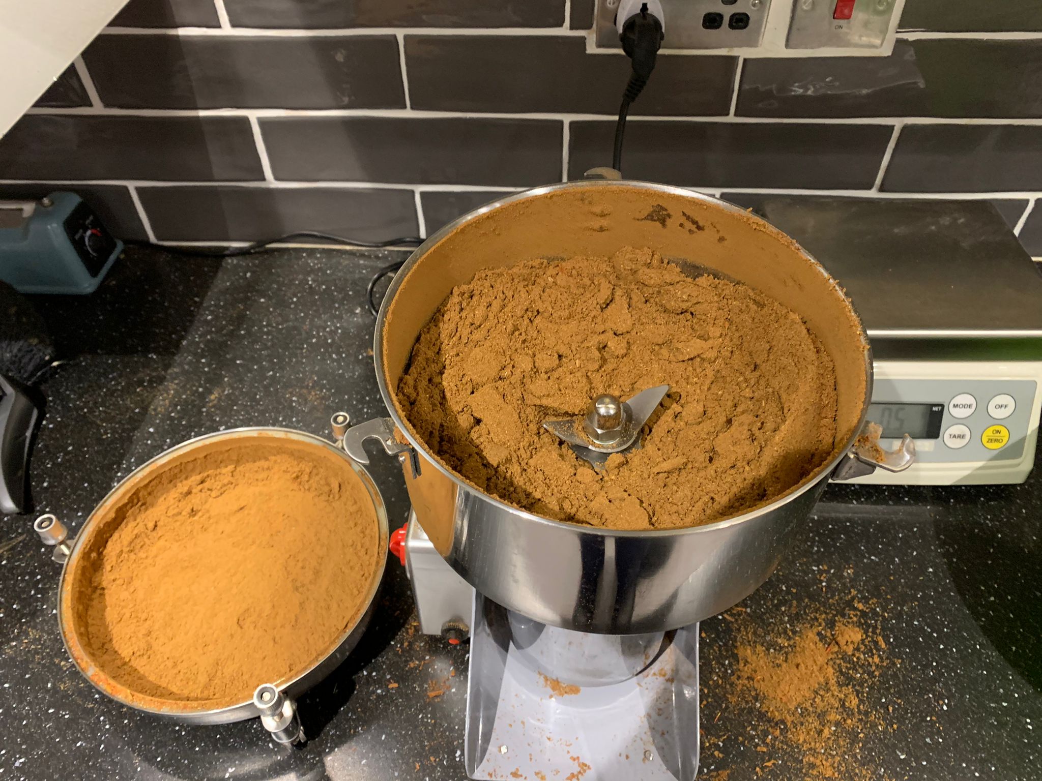 Dit Da Jow herbs being milled into powder